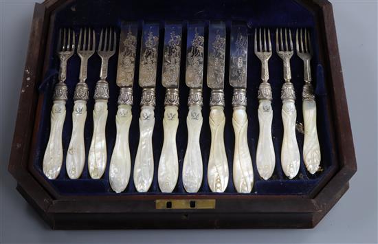 A cased matched set of 6 (ex 12) pairs of Victorian mother of pearl handled silver dessert eaters, Martin, Hall & Co, Sheffield, 1861/2